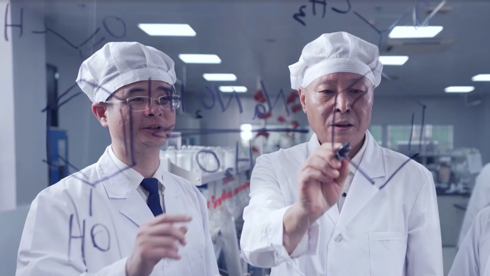 Two DEVA PhD experts discussing advanced skincare R&D insights and technology