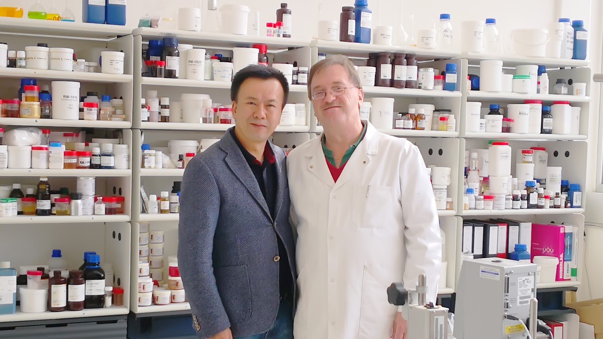 DEVA team and Swiss skincare experts collaborating in the R&D laboratory